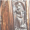 Carving of 16th C vicar in St Edmund's choir stalls