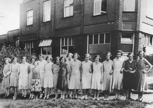 Homeknit employees outside the factory