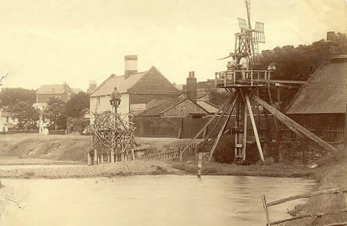 Salt works showing wind and hand pumps