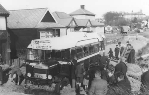 The Wenhaston and Blythburgh bus gets bogged down on Ferry Road en route to Southwold Ferry. 12 February 1938