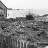 The marsh behind Ferry Road showing furniture and effects swept out of homes