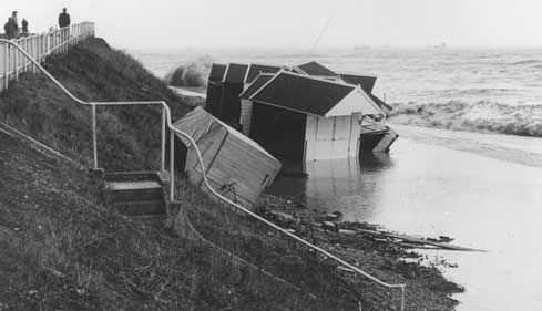 11 am on 1st Feb. Only a few wrecked beach huts remain on the promenade. 