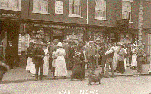 Waiting for News outside Chapman's Newsagents in Southwold.